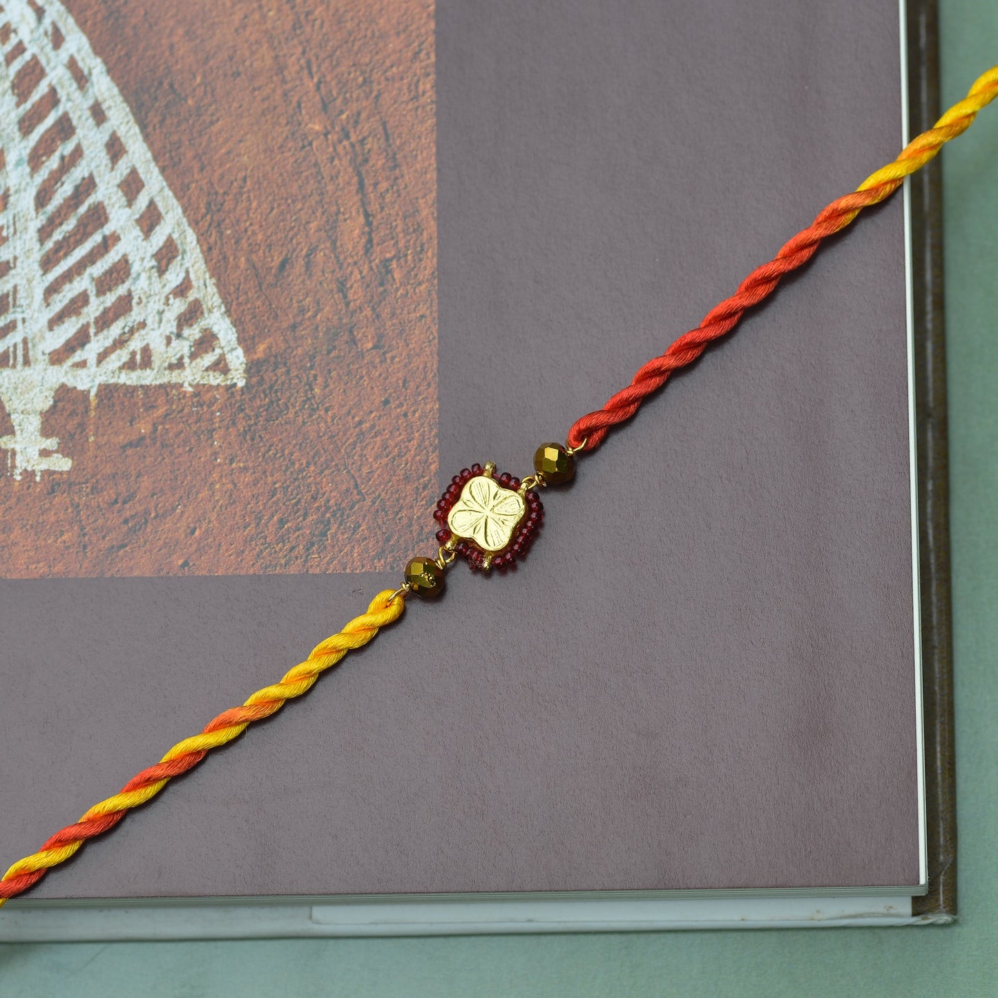 RAKHI (RED BEADS)