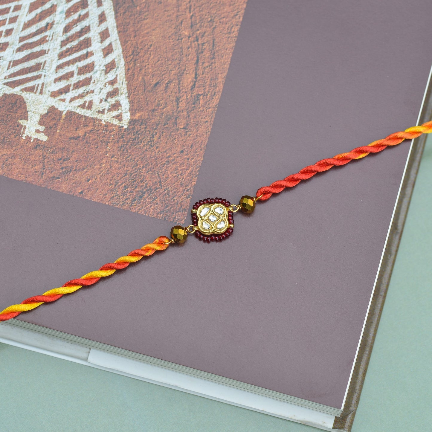 RAKHI (RED BEADS)